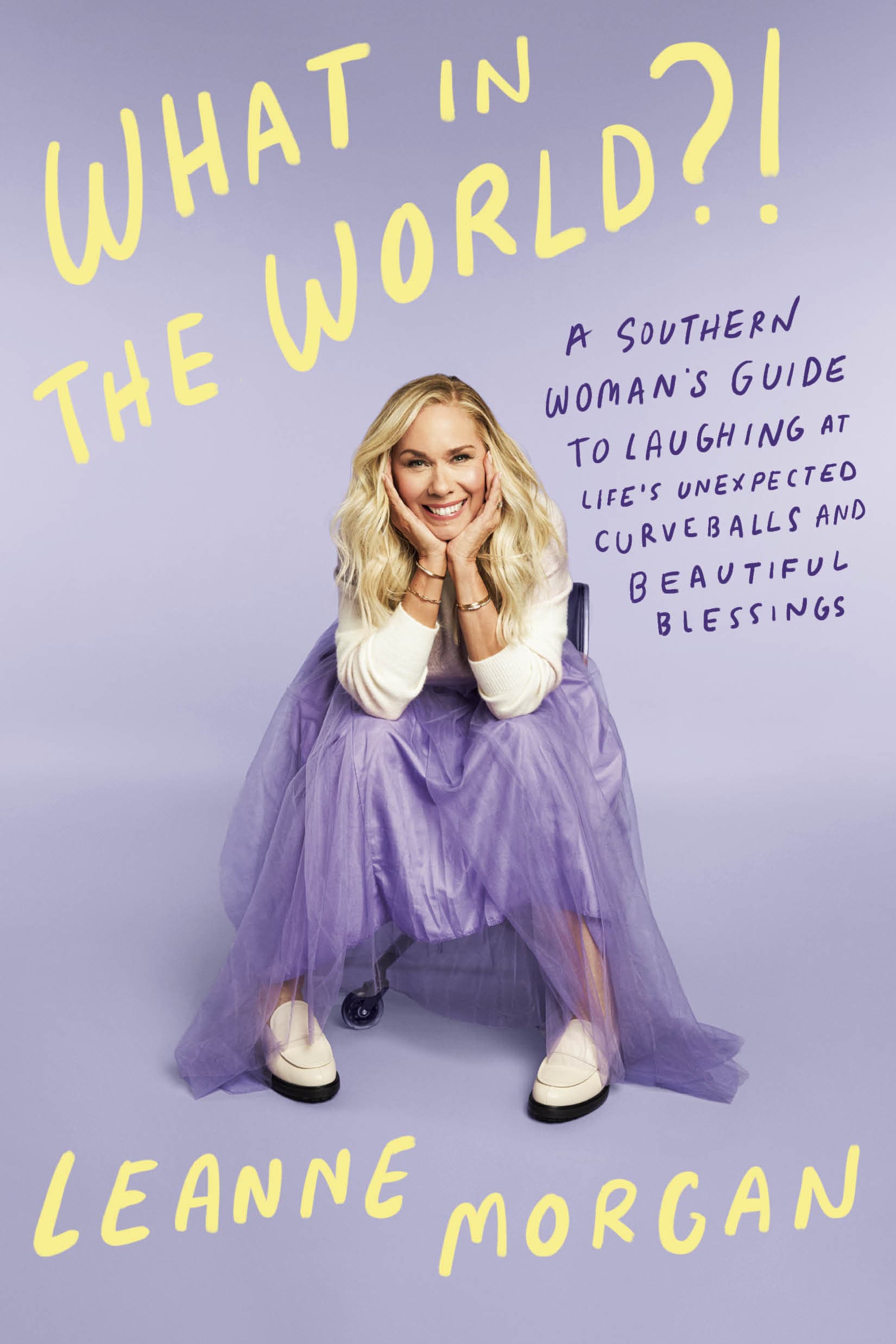 What in the World?!: A Southern Woman's Guide to Laughing at Life's Unexpected Curveballs and Beautiful Blessings book cover